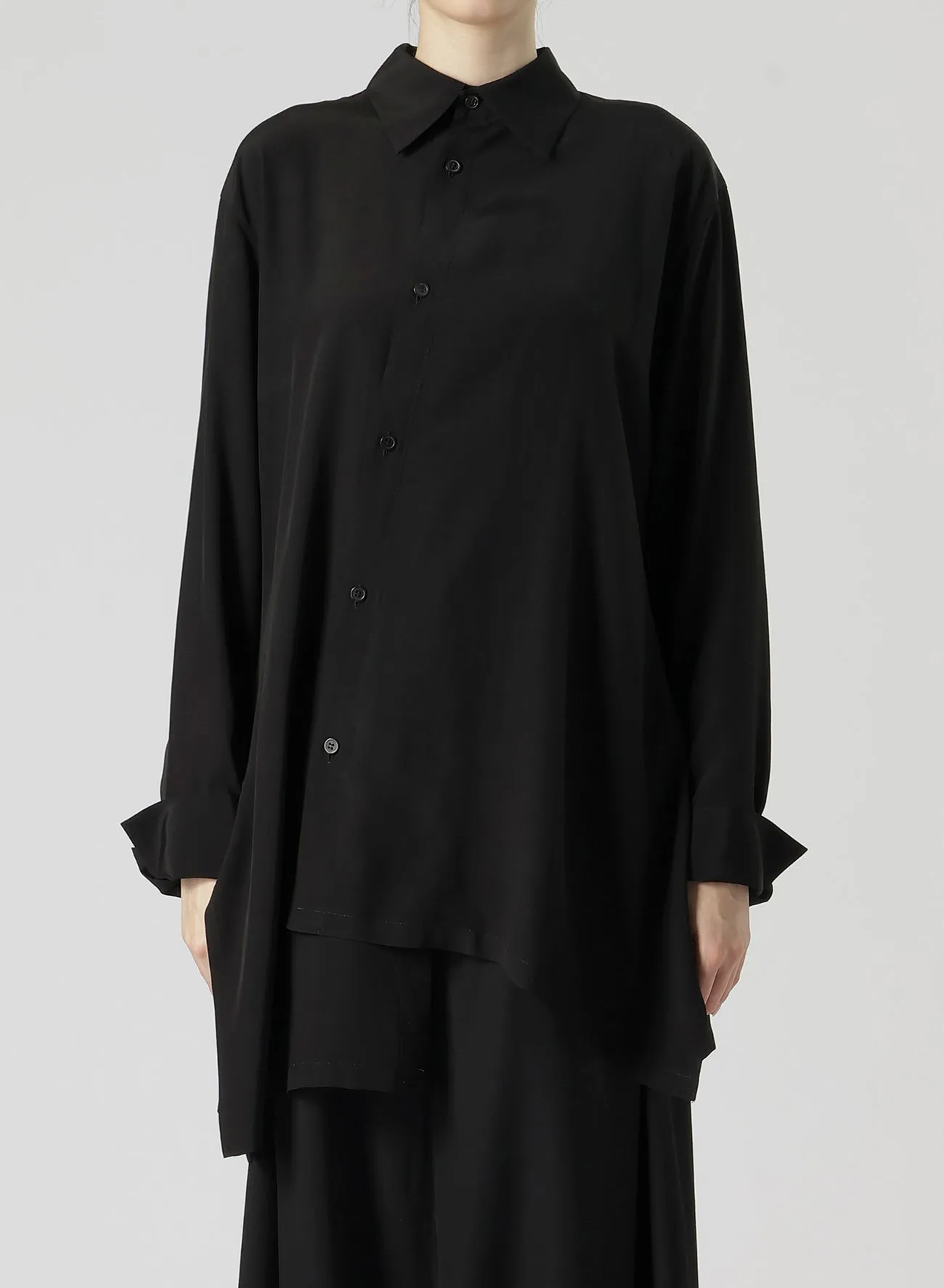 SPUN RY CLOTH R-ASYMMETRIC FLARE BLOUSE